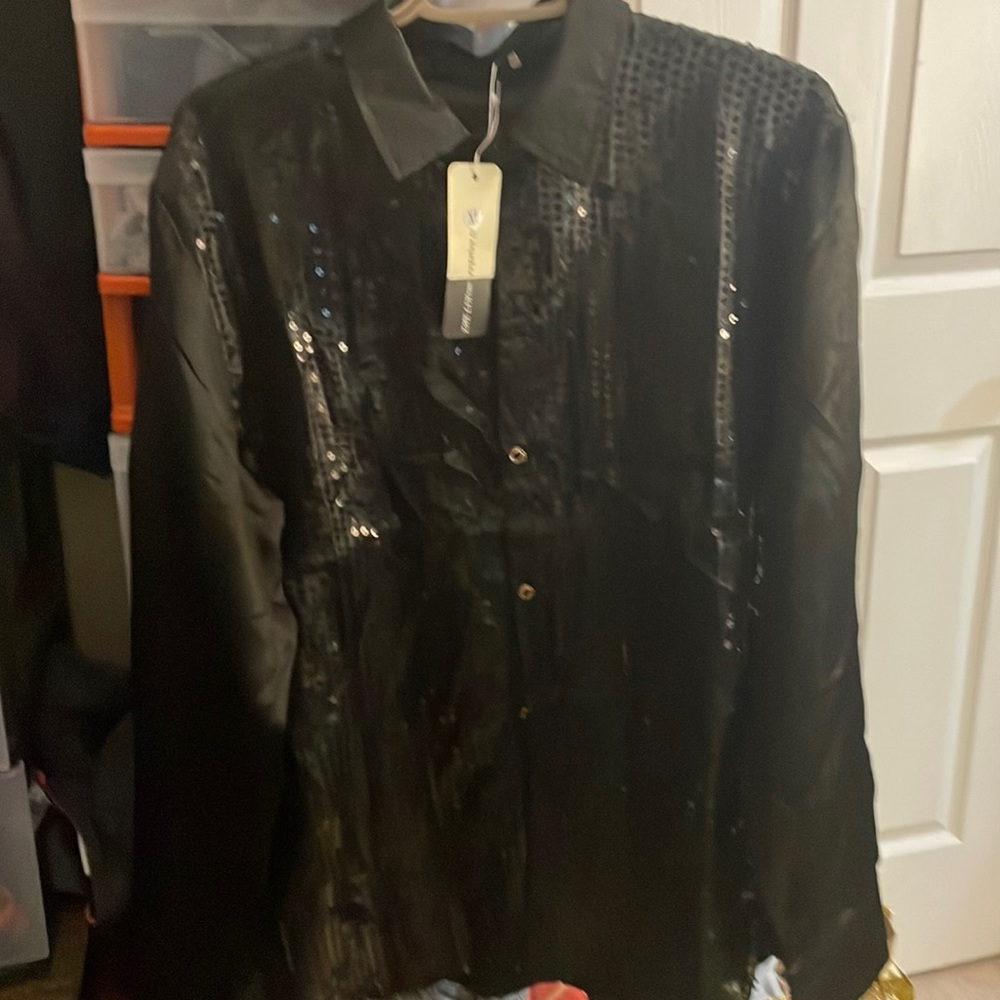 Gorgeous bedazzled black blouse this is new with tags